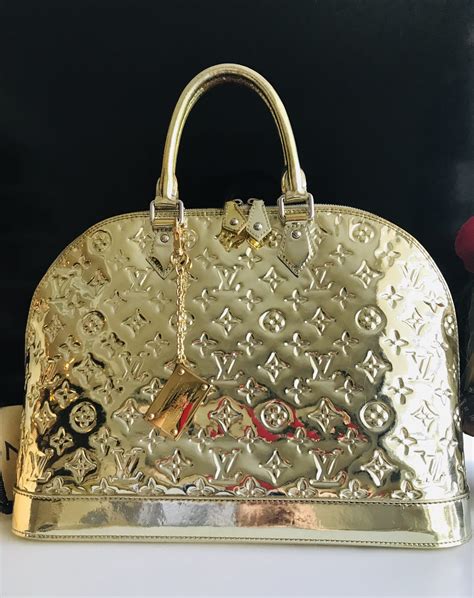 is louis vuitton hardware gold plated|Louis Vuitton metal handbags.